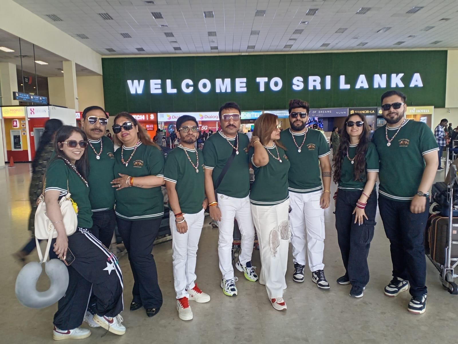 A family group in matching green shirts arriving in Sri Lanka