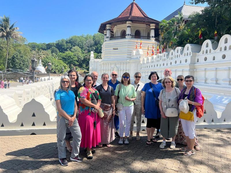 A tour group in front of the Temple of the Tooth in Kandy